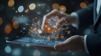 Magical sparkles and light particles emerge from smartphone screen held by business person's hand against dark background with bokeh lights for digital transformation concept.
