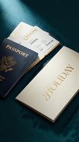 Passport with boarding passes to Paris and elegant gold foil holiday envelope on teal fabric, travel gift concept.