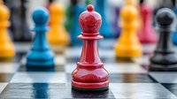 Red bishop chess piece on board with colorful pawns in soft focus background, strategic game concept showing leadership and competition.
