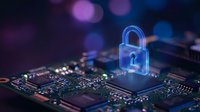 Cybersecurity concept with glowing blue padlock on computer circuit board representing data protection and digital security technology.