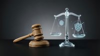 Wooden gavel and scales of justice with cybersecurity shield icons representing legal protection in digital law and data privacy regulations.