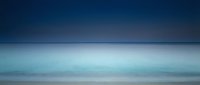Serene coastal landscape with soft blue and gray tones, calm ocean waters meeting misty horizon, minimalist seascape for relaxation and wellness design projects.