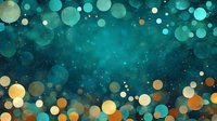 Magical turquoise and gold bokeh effect on dark background with glowing particles and blurred circles creates dreamy atmospheric backdrop for festive designs.