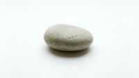 Single smooth gray stone pebble isolated on white background for zen meditation spa wellness design projects and natural decoration concepts.
