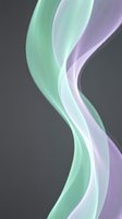Abstract flowing waves in mint green and lavender purple colors creating elegant curved shapes on dark background for modern design projects.