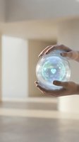Hands protecting glowing digital health sphere with heart icon and medical data interface for healthcare technology and wellness protection concepts.