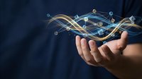 Man holding glowing digital network waves with connected nodes, representing data flow, technology innovation, and wireless communication for business solutions.