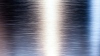 Abstract motion blur background with diagonal light streaks in blue, white and brown tones creating dynamic pattern for modern design projects.