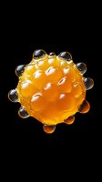 Golden amber sphere with liquid droplets clustered around its surface, isolated on black background. Suitable for cosmetics, skincare, wellness, and beauty product packaging design.