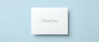 White thank you card with elegant minimalist typography on a soft blue background, conveying gratitude and appreciation for events and celebrations.