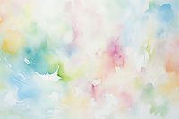 Soft pastel watercolor background with delicate blending of pink, blue, yellow and green hues creates dreamy abstract art suitable for gentle design projects.