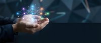 Businessman holding glowing network connections in cupped hands representing digital transformation and connectivity solutions for modern business.