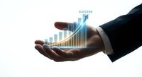 Businessman hand holding glowing growth chart with upward arrow showing financial progress and business development on white background.