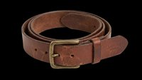 Vintage brown leather belt with brass buckle, isolated on transparent background, ready for t-shirt design, clipart, stickers, print-on-demand products and sublimation projects.