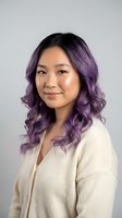 Young Asian woman with purple ombre hair wearing beige cardigan smiling at camera in studio portrait for beauty and fashion concepts.