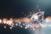 Brilliant diamond with light reflections and sparkles on blurred bokeh background, luxury jewelry concept for wedding and engagement designs.