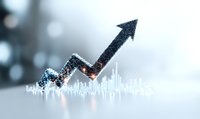 Glowing arrow graph showing upward market trend with bokeh light effect background, representing financial growth and business success analytics.