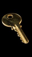 Brass house key isolated on transparent background, ready for stickers, clipart, print on demand, T-shirt design, and sublimation projects.