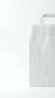 White paper shopping bag with flat handles on a clean white background, mockup for branding, retail, and packaging design projects.