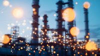 Industrial refinery at dusk with glowing network connections overlay and bokeh light effects against blue twilight sky, modern technology concept.