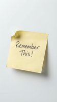 Yellow adhesive note with handwritten text "Remember This!" pinned to white wall, conveying reminder, memory, and organization concepts for business and office design projects.