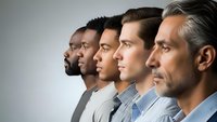 Diverse group of professional men in profile view showing different ages and ethnicities in business attire against neutral background for corporate concepts.