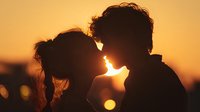 Romantic couple silhouette touching foreheads at golden sunset creating intimate moment with warm bokeh lights and dreamy atmosphere for love concepts.