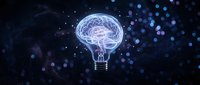 Glowing brain inside lightbulb against starry space background representing innovation, creativity, intelligence and bright ideas for business concepts.