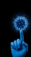 Blue glowing coronavirus particle floating above medical gloved hand finger on dark background for healthcare and pandemic awareness concepts.