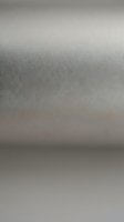 Abstract gray metallic surface with smooth gradient texture and subtle reflective finish for modern design backgrounds.