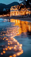 Illuminated beachfront resort with warm golden lights reflecting on wet sand at twilight, creating magical bokeh effect along shoreline as waves gently lap the beach.