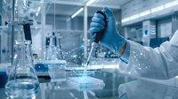 Scientist in blue gloves conducting laboratory research with pipette and petri dish in modern sterile facility for medical testing and analysis.