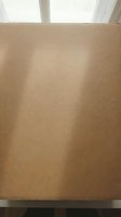 Brown kraft paper texture background with natural fiber pattern and smooth surface for packaging design and eco-friendly branding projects.