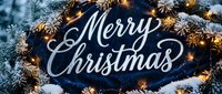 Merry Christmas calligraphy text on dark blue background with snow-covered pine branches and glowing golden fairy lights festive holiday greeting.