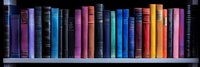 Colorful hardcover books arranged in row on dark shelf, spines showing vibrant spectrum from purple to orange, creating rainbow effect against black background.