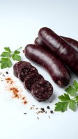 Dark blood sausage with herbs and spices on white background, traditional European cuisine ingredient for gourmet cooking and culinary preparations.