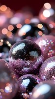 Sparkling pink glitter Christmas baubles with soft bokeh lights background creating magical holiday atmosphere. Festive decorative ornaments in rose gold tones.