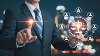 Professional businessman in suit touching digital interface with justice scales and network connections representing legal technology and law firm services.