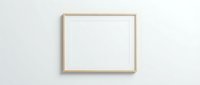 Empty wooden picture frame hanging on white wall ready for artwork display and home decoration mockup.