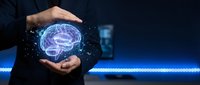 Businessman hands protecting glowing digital brain hologram with neural networks on dark blue background for AI technology and innovation concepts.