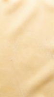 Soft beige textured background with warm neutral tones and subtle light variations, suitable for overlays, web design, and creative projects.