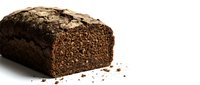 Dark rye bread loaf with dense texture and seeds, sliced to show interior crumb structure, isolated on white background for food photography and design.