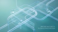 Young professional male, Caucasian appearance, wearing business casual attire, analyzing water flow systems and pipeline infrastructure in modern laboratory setting for water security and innovation projects.