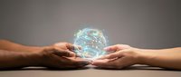 Two pairs of hands gently holding glowing digital brain with neural network connections, symbolizing collaboration in artificial intelligence and technology.