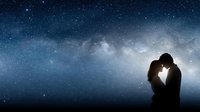 Romantic couple silhouette embracing under starry night sky with Milky Way galaxy creating magical atmosphere for love and connection.