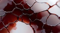 Macro shot of metallic mesh structure with dark red background creating abstract geometric pattern. Artistic close-up reveals intricate network of connected cells.