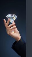 Female hand holding luminous diamond gemstone with prismatic light refraction against dark background, suitable for luxury, jewelry, wealth, success, and premium product marketing.