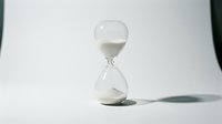 Hourglass with flowing sand on white background, isolated and ready for design use on websites, presentations, and marketing materials.