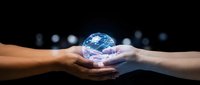 Two hands holding glowing digital globe with blue light network connections, representing global communication, technology partnership, and worldwide business collaboration.