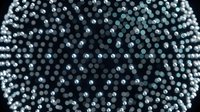 Dark metallic spheres with reflective surfaces creating abstract geometric pattern for modern design backgrounds and digital art projects.